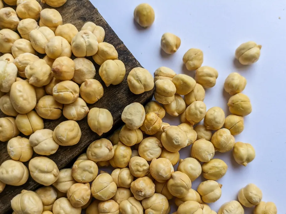 raw-chickpeas-on-wooden-cutting-board