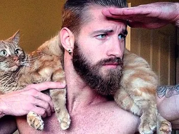 Meet Travis DesLaurier, Hot Cat Model, Humorist, Entrepreneur