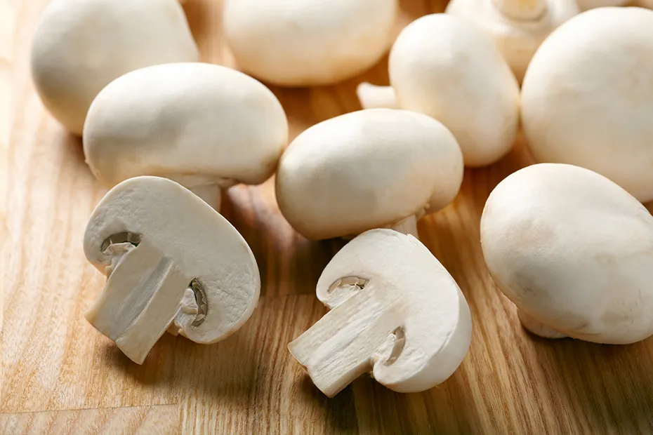 Champignon mushrooms on the table