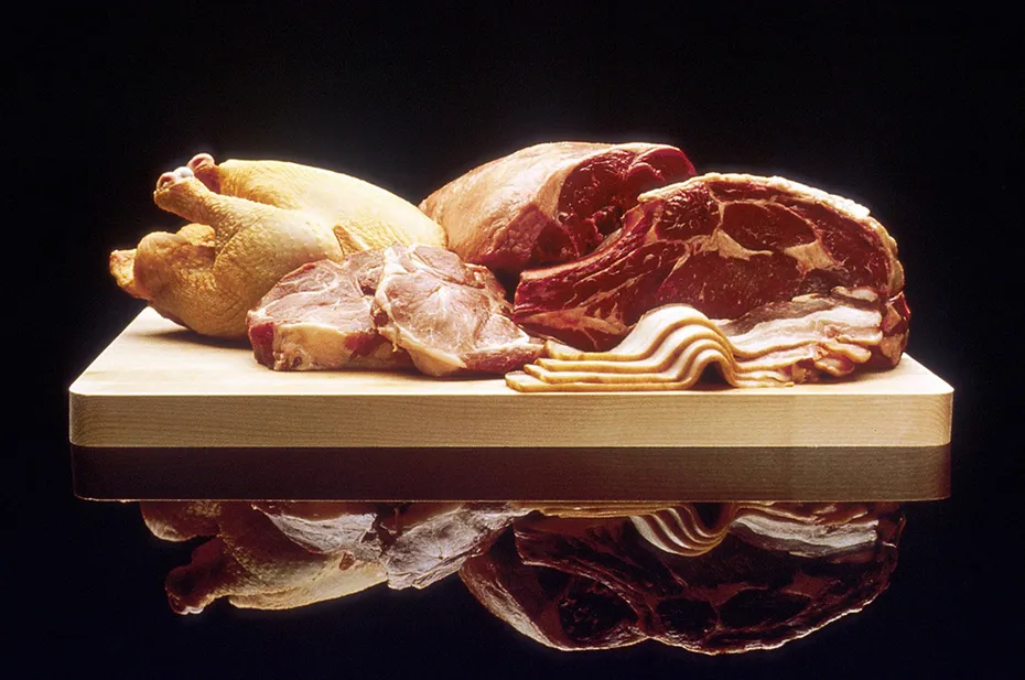 variety of meat on the chopping board