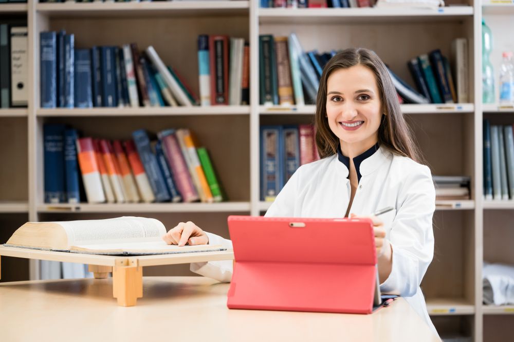 Medical student in library