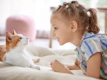 How to Help Children & Cats Bond: 9 Vet-Verified Tips