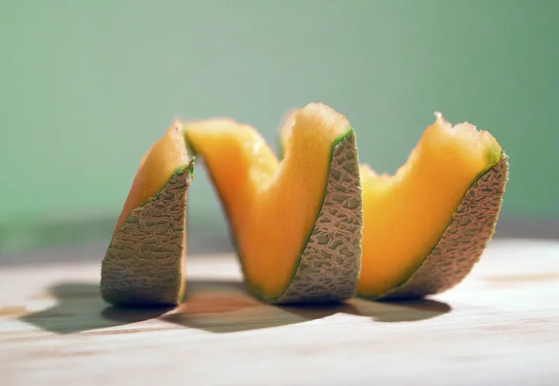 three slices of cantaloupe