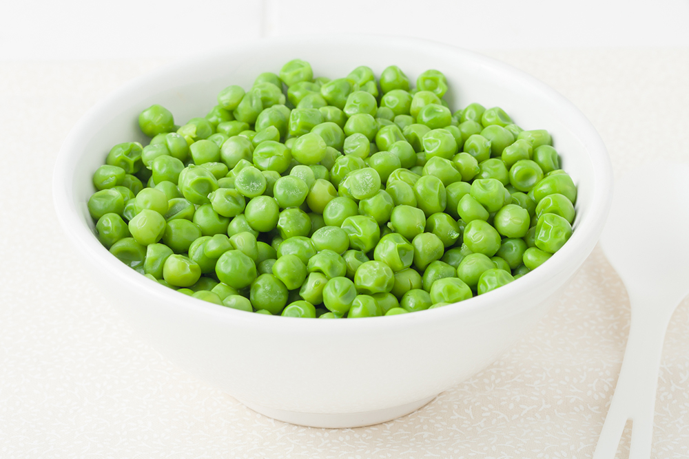 a bowl of green peas