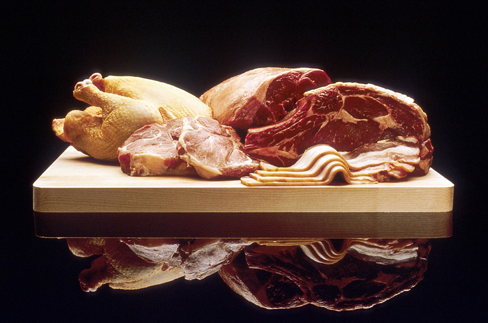 variety of meat on the chopping board